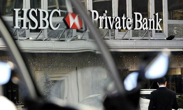 Quase 180 bilhões de dólares teriam transitado por contas do HSBC em Genebra, para fraudar o fisco, lavar dinheiro sujo ou financiar o terrorismo internacional / Foto: AFP 