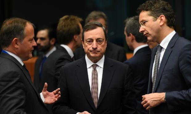 Presidente do BC, Mario Draghi, durante encontro no qual foi anunciado a injeção de dinheiro na zona do euro / Foto: Emmanuel Dunand / AFP
