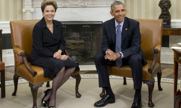 Obama e Dilma iniciaram uma reunião que deve abordar a cooperação na área de meio ambiente e um forte estímulo ao crescimento do intercâmbio comercial / Foto: AFP