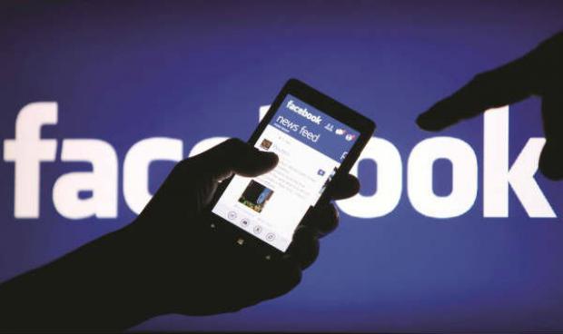 O Facebook fechou 2015 com 1,59 bilhão de usuários, dos quais cerca de 65% acessam a rede social / Foto: AFP