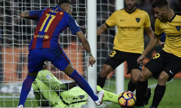 O Barcelona não conseguiu passar de um decepcionante empate por 0 a 0 com o Málaga neste sábado. / Foto: Lluis Gene / AFP