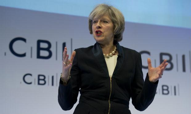 Theresa May não deu respostas definitivas sobre questões-chave da imigração e do acesso ao mercado europeu. / Foto: Justin Tallis / AFP