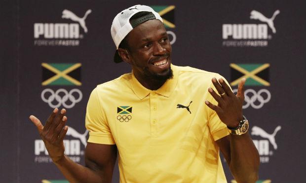 Dono de nove ouros olímpicos, Bolt também se manteve imbatível durante a temporada em todas as provas que disputou. / Foto: AFP.