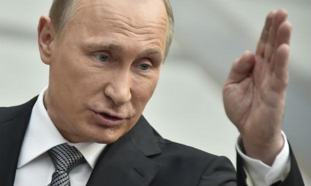 "2016 está terminando. Não foi fácil, mas as dificuldades que enfrentamos nos uniram", disse Putin. / Foto: AFP